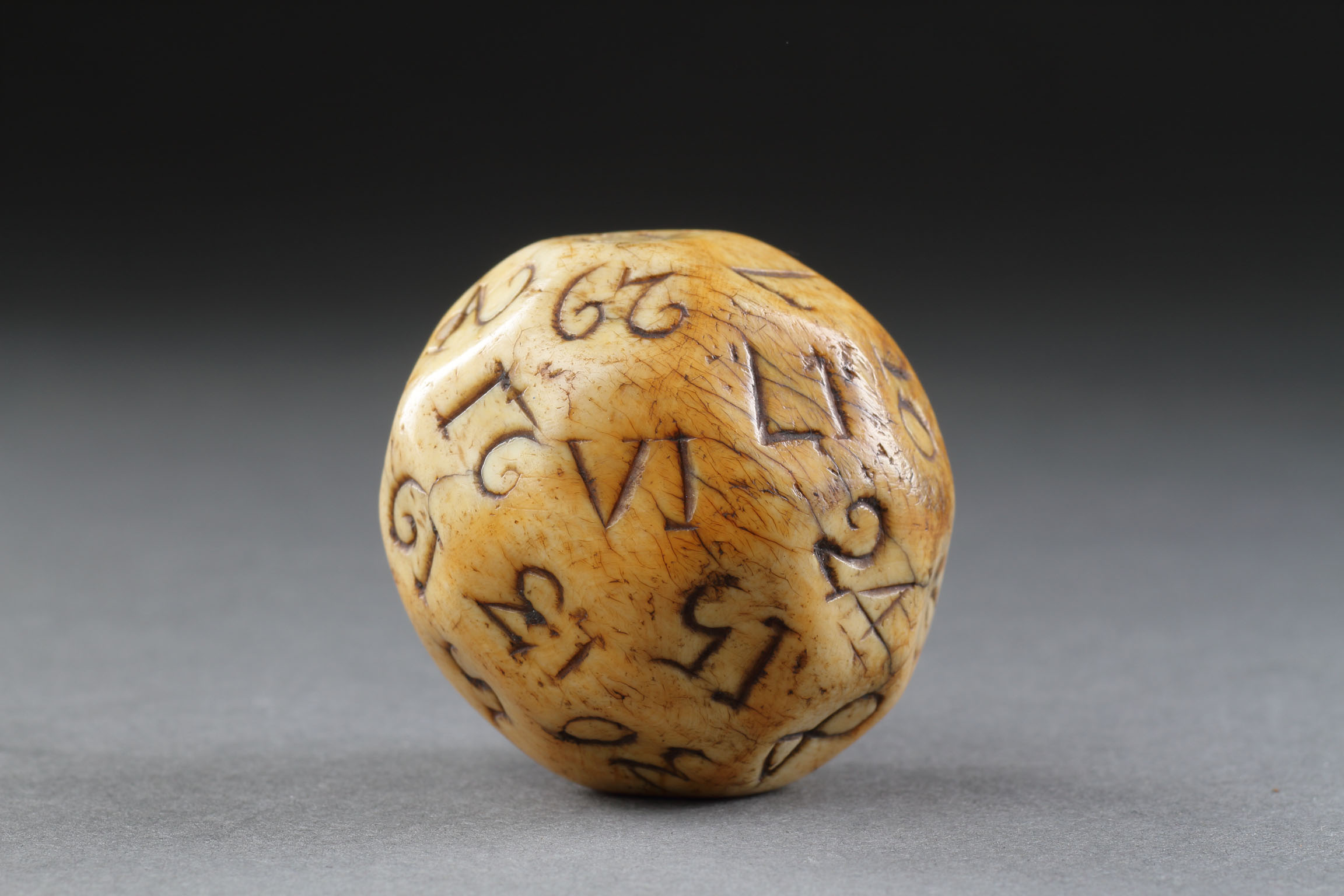 An Early British Sailors Walrus Ivory Teetotum Ball Numbered 1 - 32 on Faceted Sides 
